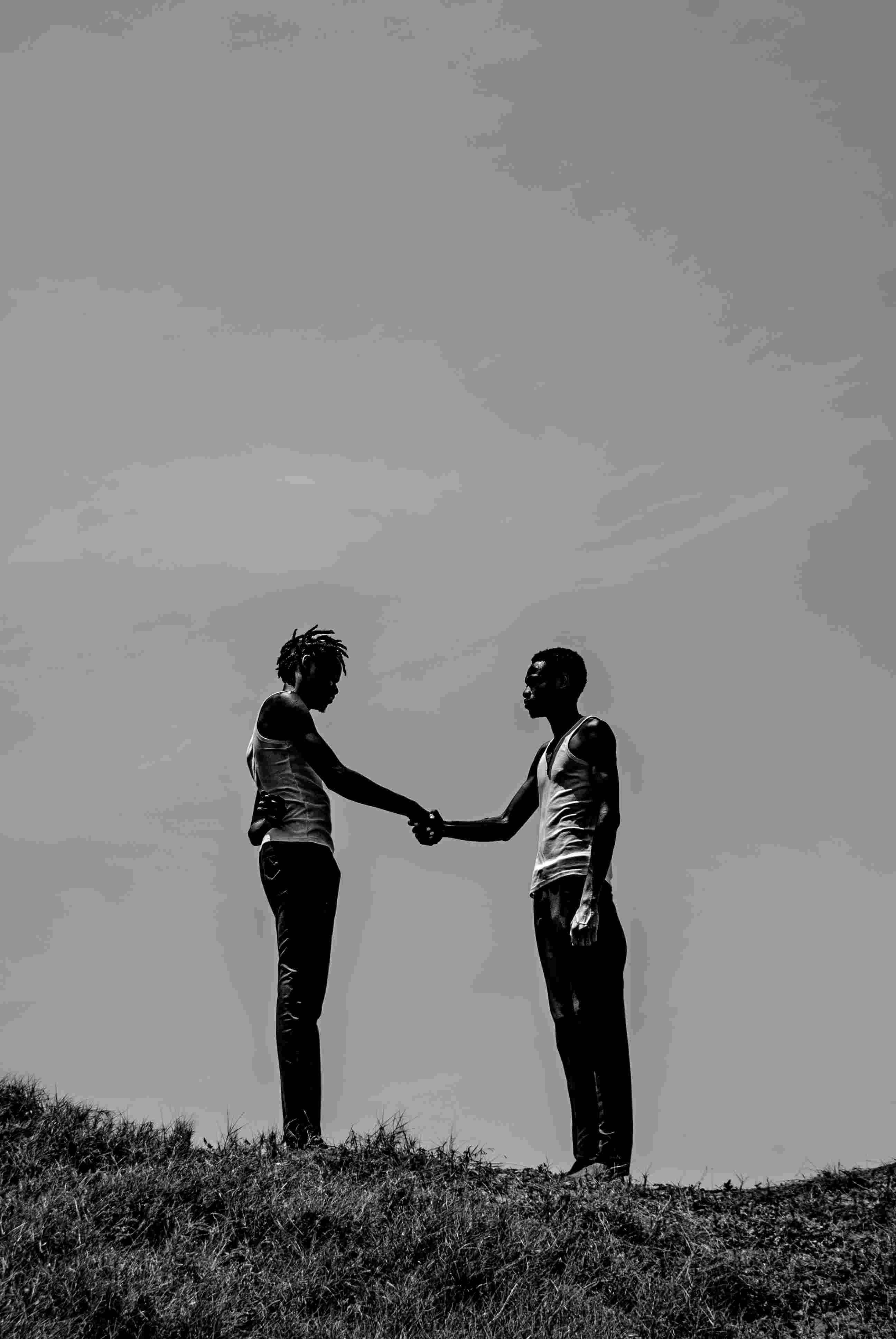 two men shaking hands